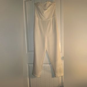 Express ivory color jumpsuit size 6 with zipper in the back.